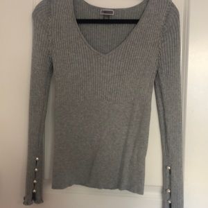 Grey V neck sweater with pearl embellishments